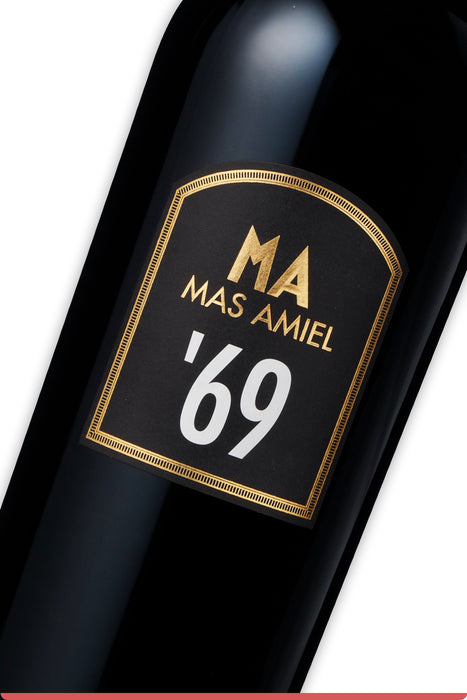 <span style='font-weight: bolder'>Millésime 69 </span><br><small style='color:grey'>Vin Doux Naturel - AOC Maury</small>